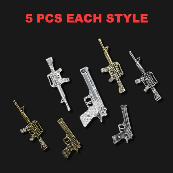 weapon-shaped nail charms display - 3
